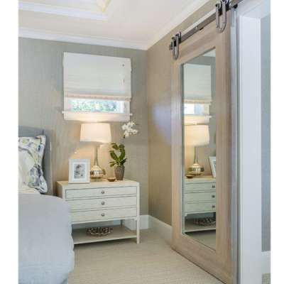 Mirrored door for bathroom with saddle shape sliding door hardware